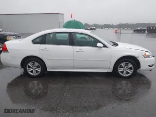 2015 Chevrolet Impala Limited LS with VIN 2G1WA5E34F1125046, listed as a IAAI auction lot 41972602 with 253,674 mi miles. Bid and sale history available at carsss.com. Image 13.