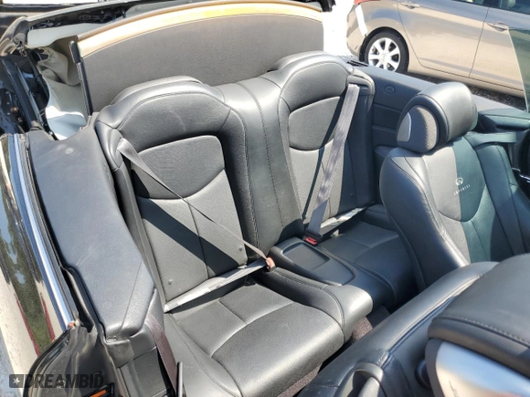 2009 Infiniti G37 Convertible with VIN JNKCV66E09M725199, listed as a Copart auction lot 71592184 with 101,779 mi miles and Salvage Title. Bid and sale history available at carsss.com. Image 10.