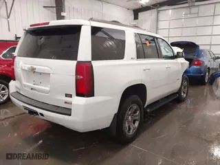 2019 Chevrolet Tahoe LT with VIN 1GNSKBKC5KR280204, listed as a IAAI auction lot 41901606 with 72,919 mi miles. Bid and sale history available at carsss.com. Image 4.