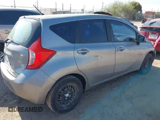 2015 Nissan Note SV with VIN 3N1CE2CP4FL412858, listed as a IAAI auction lot 42358192 with 109,695 mi miles and . Bid and sale history available at DreamBid. Image 4.