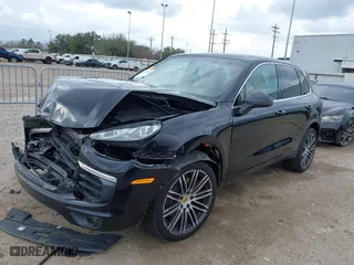 2017 Porsche Cayenne with VIN WP1AA2A2XHKA90706, listed as a IAAI auction lot 41692768 with 92,800 mi miles. Bid and sale history available at carsss.com. Image 2.