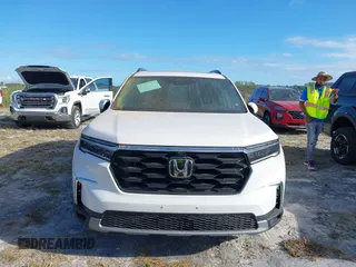 2024 Honda Pilot Elite with VIN 5FNYG1H81RB025163, listed as a IAAI auction lot 40502507 with 9,867 mi miles. Bid and sale history available at carsss.com. Image 12.