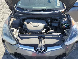 2012 Hyundai Veloster w/Gray Int z VIN KMHTC6AD9CU079542, wystawiony jako Copart lot #55998045 z przebiegiem 98 065 mil mil oraz Szkoda całkowita • Salvage title. Historia ofert i sprzedaży dostępna na DreamBid. Obrazek 11.