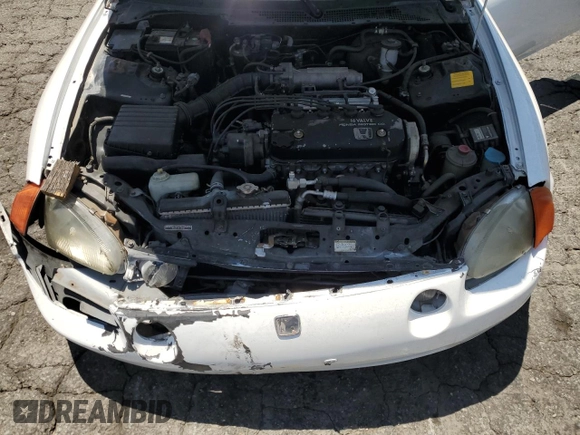 1993 Honda Civic z VIN JHMEG1246PS009614, wystawiony jako Copart lot #58163795 z przebiegiem 225 567 mil mil oraz Szkoda całkowita • Salvage title. Historia ofert i sprzedaży dostępna na DreamBid. Obrazek 11.