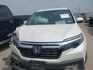 2018 Honda Ridgeline RTL-E with VIN 5FPYK3F77JB004379, listed as a IAAI auction lot 41802025 with 132,085 mi miles and . Bid and sale history available at DreamBid. Image 12.