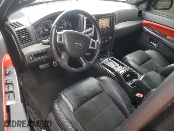 2008 Jeep Grand Cherokee SRT-8 with VIN 1J8HR78398C214004, listed as a Copart auction lot 48760375 with 165,318 mi miles and Salvage Title. Bid and sale history available at carsss.com. Image 8.