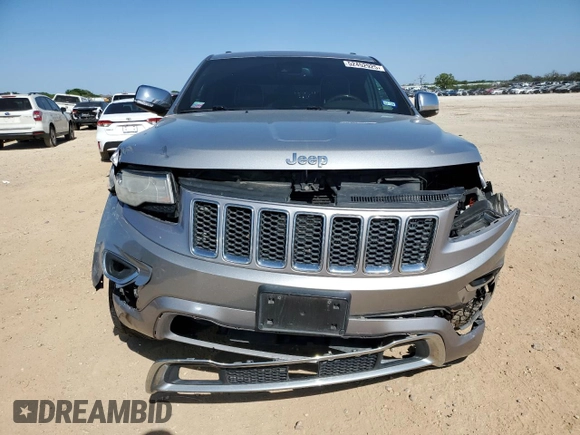 2014 Jeep Grand Cherokee Overland with VIN 1C4RJFCG7EC153156, listed as a Copart auction lot 52452925 with 152,348 mi miles and Salvage Title. Bid and sale history available at DreamBid. Image 5.