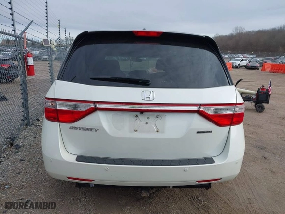 2013 Honda Odyssey Touring with VIN 5FNRL5H96DB089336, listed as a IAAI auction lot 41527990 with 128,770 mi miles. Bid and sale history available at carsss.com. Image 16.