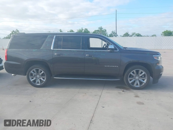 2018 Chevrolet Suburban Premier with VIN 1GNSCJKC5JR135265, listed as a IAAI auction lot 42028935 with 136,382 mi miles and . Bid and sale history available at DreamBid. Image 13.