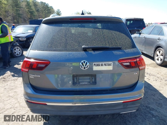 2018 Volkswagen Tiguan SEL with VIN 3VV3B7AX5JM036164, listed as a IAAI auction lot 41876403 with 108,269 mi miles and . Bid and sale history available at DreamBid. Image 16.