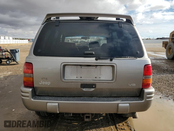 1997 Jeep Grand Cherokee Limited with VIN 1J4GZ78Y0VC556381, listed as a Copart auction lot 46221845 with 191,778 mi miles and Salvage Title. Bid and sale history available at carsss.com. Image 6.