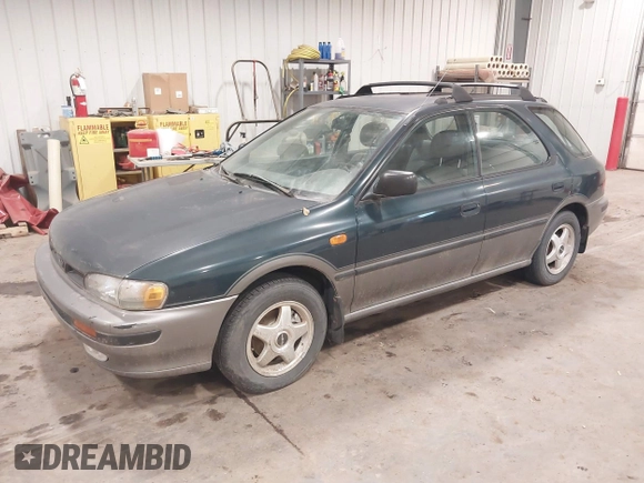 1996 Subaru Impreza Outback Special Sports with VIN JF1GF4858TH810489, listed as a IAAI auction lot 41361018 with 204,924 mi miles and . Bid and sale history available at DreamBid. Image 2.