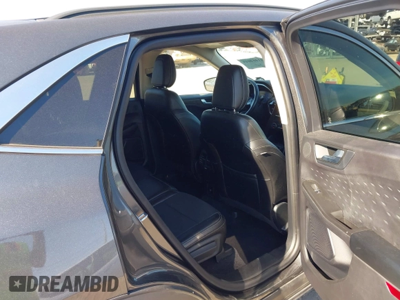 2020 Ford Escape Titanium with VIN 1FMCU9J9XLUA66440, listed as a IAAI auction lot 41464049 with 57,626 mi miles and . Bid and sale history available at DreamBid. Image 8.