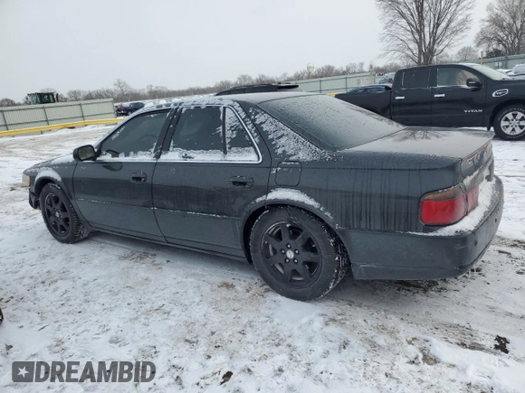 2002 Cadillac Seville Touring STS z VIN 1G6KY549X2U177791, wystawiony jako Copart lot #89313345 z przebiegiem 171 707 mil mil oraz Szkoda całkowita • Salvage title. Historia ofert i sprzedaży dostępna na DreamBid. Obrazek 2.