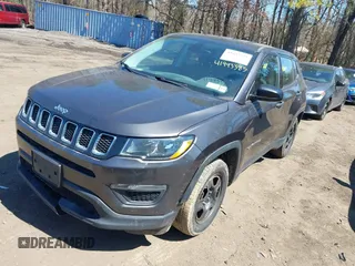 2018 Jeep Compass Sport with VIN 3C4NJCAB7JT107040, listed as a IAAI auction lot 41993385 with 251,154 mi miles. Bid and sale history available at carsss.com. Image 2.