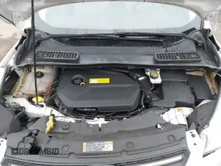 2016 Ford Escape SE z VIN 1FMCU9GX8GUA92661, wystawiony jako IAAI lot #41085877 z przebiegiem 76 632 mil mil oraz . Historia ofert i sprzedaży dostępna na DreamBid. Obrazek 10.