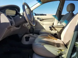 2003 Ford Focus ZTS with VIN 1FAFP38333W249101, listed as a Copart auction lot 77824534 with 163,513 mi miles and Salvage Title. Bid and sale history available at carsss.com. Image 7.