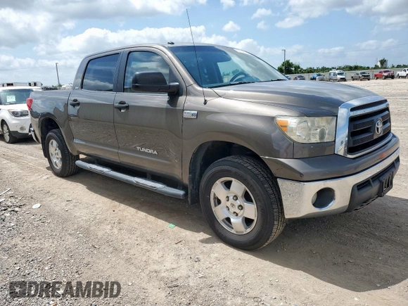 2010 Toyota Tundra with VIN 5TFDW5F12AX123529, listed as a Copart auction lot 60132615 with 264,205 mi miles and Clean title. Bid and sale history available at DreamBid. Image 4.