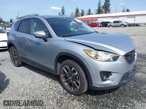 2016 Mazda CX-5 Grand Touring with VIN JM3KE4DYXG0647802, listed as a IAAI auction lot 41996854 with 85,774 mi miles. Bid and sale history available at carsss.com. Image 1.