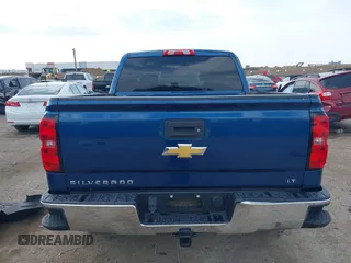 2018 Chevrolet Silverado 1500 LT with VIN 3GCPCREH1JG125997, listed as a IAAI auction lot 41884888 with 122,406 mi miles and . Bid and sale history available at DreamBid. Image 16.