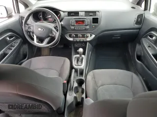 2013 Kia Rio LX z VIN KNADM4A35D6280066, wystawiony jako Copart lot #57293585 z przebiegiem 129 281 mil mil oraz Szkoda całkowita • Salvage title. Historia ofert i sprzedaży dostępna na DreamBid. Obrazek 8.