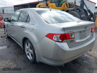 2009 Acura TSX with VIN JH4CU26619C021586, listed as a IAAI auction lot 41942680 with 171,841 mi miles. Bid and sale history available at carsss.com. Image 3.