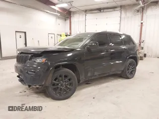 2018 Jeep Grand Cherokee Laredo E with VIN 1C4RJFAG5JC417701, listed as a IAAI auction lot 42001159 with 110,767 mi miles and . Bid and sale history available at DreamBid. Image 2.