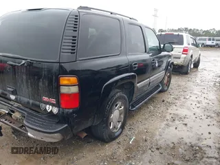 2004 GMC Yukon SLT z VIN 1GKEC13V34J307919, wystawiony jako IAAI lot #41268767 z przebiegiem Nie podano mil oraz . Historia ofert i sprzedaży dostępna na DreamBid. Obrazek 4.