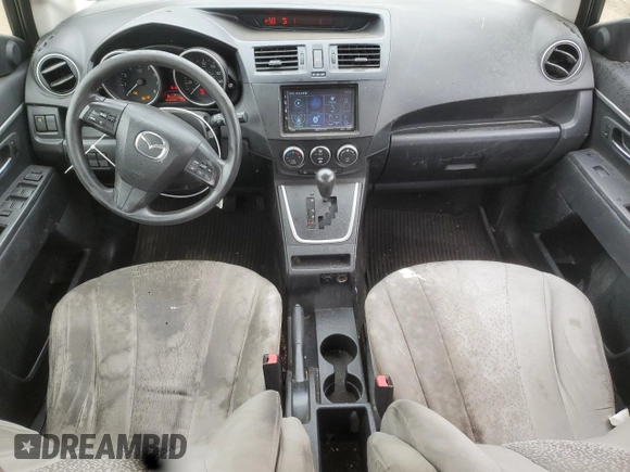 2012 Mazda 5 Sport with VIN JM1CW2BL3C0121849, listed as a Copart auction lot 61789675 with 144,379 mi miles and Salvage title. Bid and sale history available at DreamBid. Image 8.