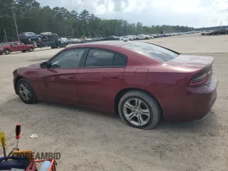2019 Dodge Charger SXT with VIN 2C3CDXBG4KH721185, listed as a Copart auction lot 57872325 with 123,429 mi miles and Salvage title. Bid and sale history available at DreamBid. Image 2.