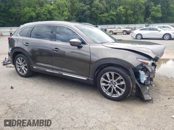 2018 Mazda CX-9 Grand Touring с VIN JM3TCADY9J0205299, выставлен на аукционе Copart как лот 60306095 с пробегом 113 766 миль миль и Списание • Salvage title. История ставок и продаж доступна на DreamBid. Изображение 4.