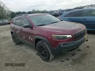 2019 Jeep Cherokee Trailhawk Elite z VIN 1C4PJMBN7KD211588, wystawiony jako Copart lot #49307824 z przebiegiem 54 781 mil mil oraz Szkoda całkowita • Salvage title. Historia ofert i sprzedaży dostępna na DreamBid. Obrazek 11.