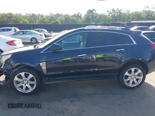 2014 Cadillac SRX Performance Collection with VIN 3GYFNCE39ES613051, listed as a IAAI auction lot 42113063 with 82,952 mi miles and . Bid and sale history available at carsss.com. Image 14.