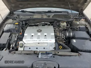 2000 Cadillac DeVille DTS z VIN 1G6KF5794YU249059, wystawiony jako Copart lot #71614494 z przebiegiem 121 611 mil mil oraz Szkoda całkowita • Salvage title. Historia ofert i sprzedaży dostępna na DreamBid. Obrazek 11.