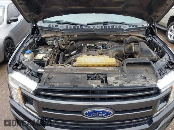 2019 Ford F-150 XL with VIN 1FTEW1EP7KKF18114, listed as a IAAI auction lot 41957860 with 106,017 mi miles and . Bid and sale history available at DreamBid. Image 10.