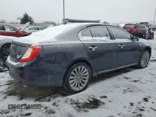 2014 Lincoln MKS with VIN 1LNHL9EK0EG602349, listed as a Copart auction lot 45211525 with 51,616 mi miles and Salvage Title. Bid and sale history available at DreamBid. Image 3.
