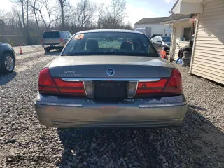 2003 Mercury Grand Marquis LS Premium with VIN 2MEFM75W93X684541, listed as a Copart auction lot 52642415 with 144,114 mi miles and Salvage Title. Bid and sale history available at carsss.com. Image 6.