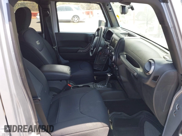 2016 Jeep Wrangler Unlimited Freedom with VIN 1C4BJWDG7GL109953, listed as a IAAI auction lot 42140111 with 24,570 mi miles and . Bid and sale history available at DreamBid. Image 5.
