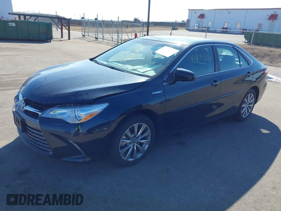 2015 Toyota Camry LE z VIN 4T1BD1FK8FU148065, wystawiony jako IAAI lot #41843278 z przebiegiem 91 137 mil mil oraz . Historia ofert i sprzedaży dostępna na DreamBid. Obrazek 17.