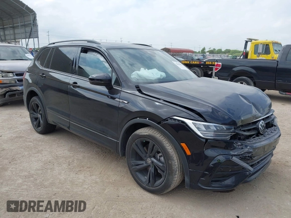 2023 Volkswagen Tiguan SE R-Line Black with VIN 3VVCB7AX0PM122636, listed as a IAAI auction lot 42040494 with 8,589 mi miles and . Bid and sale history available at DreamBid. Image 1.
