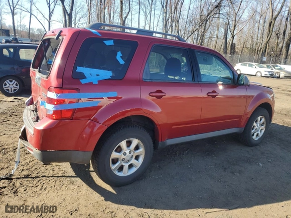 2010 Mazda Tribute Touring with VIN 4F2CY9C77AKM04941, listed as a Copart auction lot 50802955 with 118,480 mi miles and Salvage Title. Bid and sale history available at carsss.com. Image 3.
