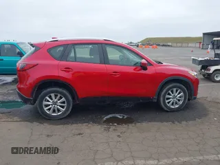 2015 Mazda CX-5 Sport z VIN JM3KE2BE9F0452625, wystawiony jako IAAI lot #42114867 z przebiegiem 167 849 mil mil oraz . Historia ofert i sprzedaży dostępna na DreamBid. Obrazek 12.