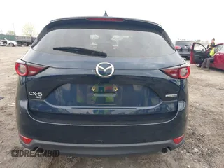 2021 Mazda CX-5 Touring with VIN JM3KFBCM1M1336457, listed as a IAAI auction lot 42034330 with 39,910 mi miles. Bid and sale history available at carsss.com. Image 15.