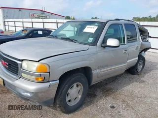 2004 GMC Yukon XL SLT with VIN 3GKEC16Z64G292509, listed as a IAAI auction lot 40948787 with 143,099 mi miles. Bid and sale history available at carsss.com. Image 2.
