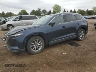 2018 Mazda CX-9 Touring z VIN JM3TCACY9J0233878, wystawiony jako Copart lot #54966255 z przebiegiem 88 732 mil mil oraz Szkoda całkowita • Salvage title. Historia ofert i sprzedaży dostępna na DreamBid. Obrazek 1.