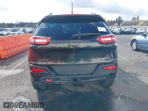2015 Jeep Cherokee Trailhawk with VIN 1C4PJMBS7FW699392, listed as a IAAI auction lot 41797617 with 1 mi miles. Bid and sale history available at carsss.com. Image 16.