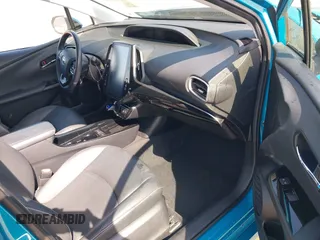 2021 Toyota Prius LE with VIN JTDKAMFP7M3180504, listed as a IAAI auction lot 41985409 with 56,617 mi miles and . Bid and sale history available at DreamBid. Image 5.