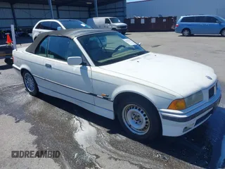 1996 BMW 3-Series 328IC with VIN WBABK8324TET92418, listed as a IAAI auction lot 41815664 with 128,661 mi miles. Bid and sale history available at carsss.com. Image 1.