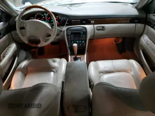 2000 Cadillac Seville Touring STS z VIN 1G6KY5494YU220613, wystawiony jako Copart lot #87338724 z przebiegiem 106 313 mil mil oraz Szkoda całkowita • Salvage title. Historia ofert i sprzedaży dostępna na DreamBid. Obrazek 8.