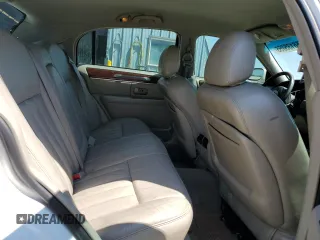 2003 Lincoln Town Car Signature z VIN 1LNHM82W43Y618527, wystawiony jako Copart lot #56135055 z przebiegiem 135 847 mil mil oraz Szkody całkowita. Historia ofert i sprzedaży dostępna na DreamBid. Obrazek 10.